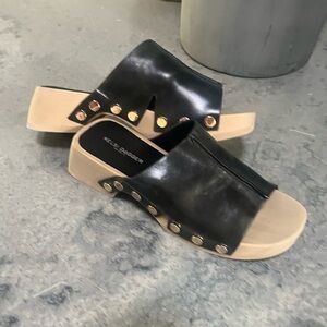 Kelsi Dagger Black Leather Slide Mules with Gold Studs